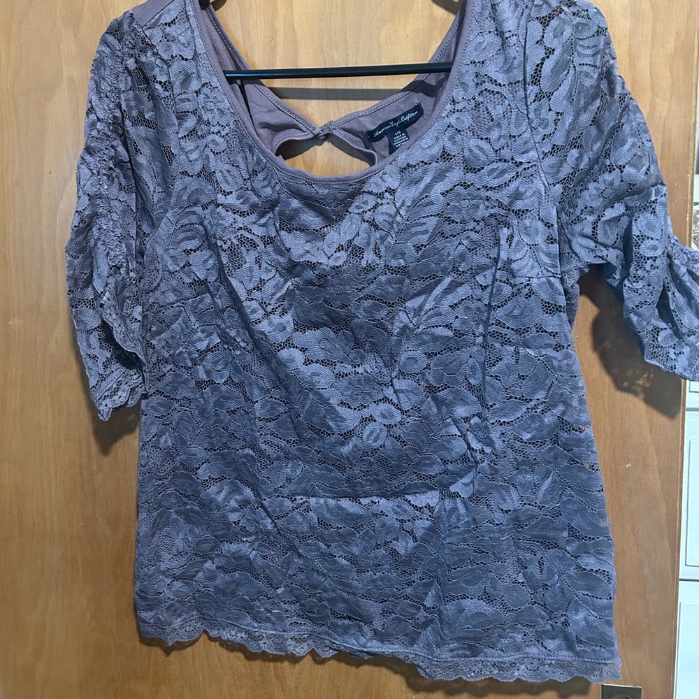 Purple American Eagle Top
Lace on the front and sleeves